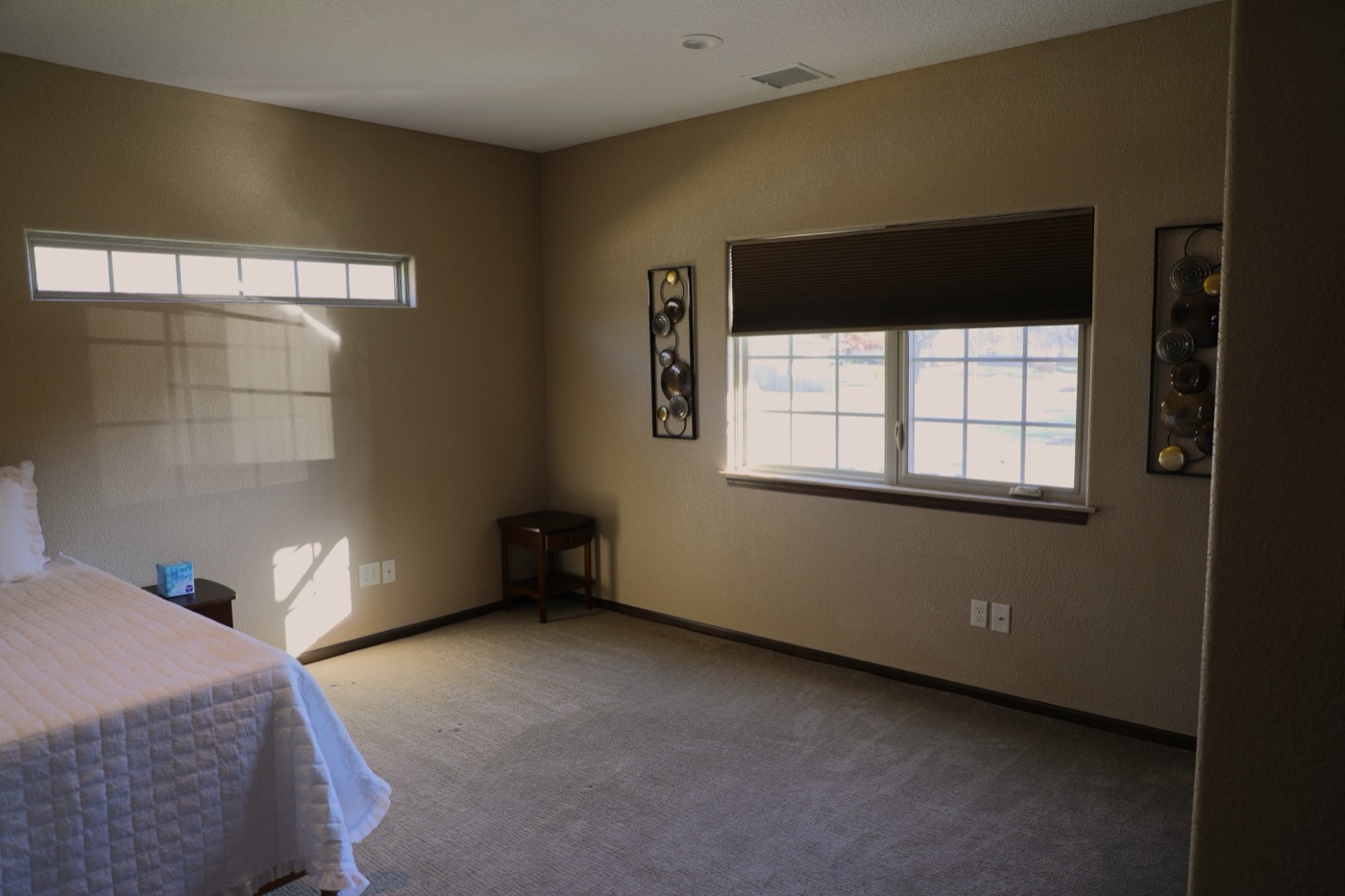 Spacious bedroom at Mi Casa Care Homes Towanda House, a residential senior care home near Towanda, Kansas